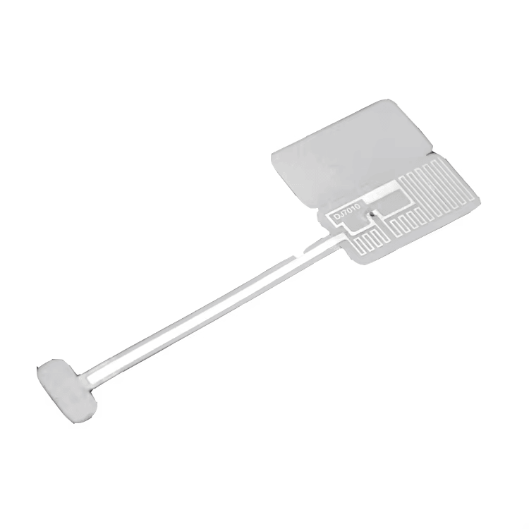 Ova slika proizvoda prikazuje izloženo jezgro RFID etikete za nakit sa strukturom antene vidljivom ispod zaštitnog sloja.