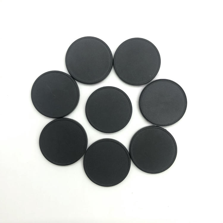 Beli ABS RFID disk tag koji omogućava lasersko graviranje brojeva ili logotipa kompanije po želji.