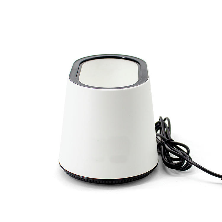 Uspravna prednja slika skenera R46 payment box prikazuje uzdignutu površinu za skeniranje i kabl skupljen sa desne strane.