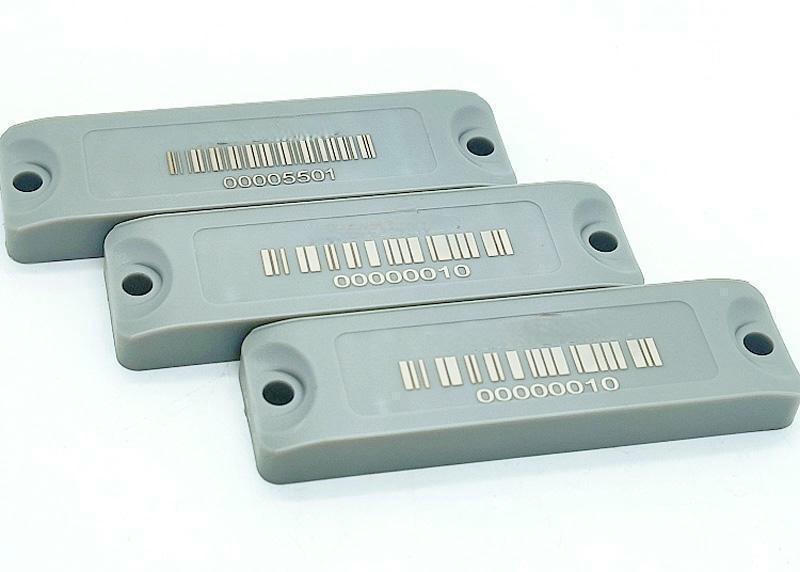 ABS RFID oznake za metal za terenska sredstva na otvorenom, prikazane iz jasne perspektive laserski sečenog detalja za primene ABS RFID oznaka za metal.